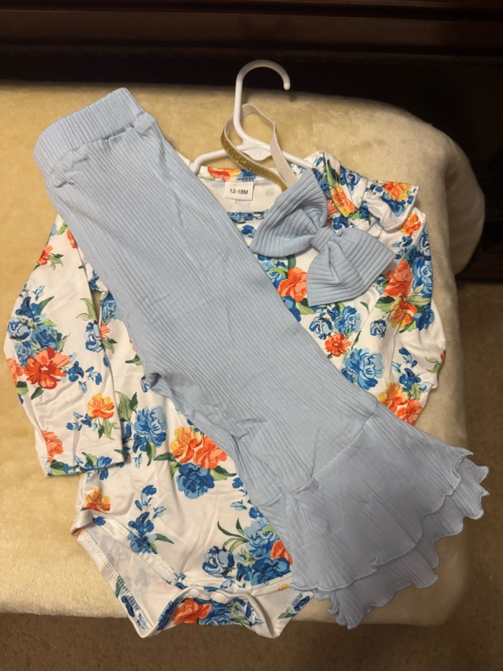 Floral matching set with ruffled light blue leggings.